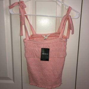 Pink smocked stripe top